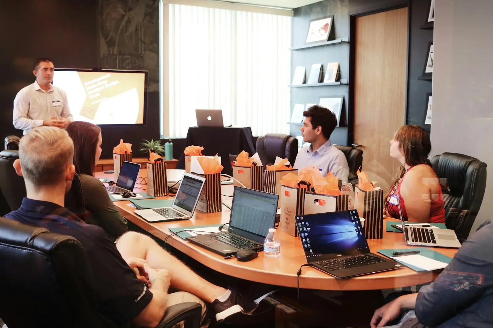 Documentary boardroom with overlapping conflicts of advisors and sellers